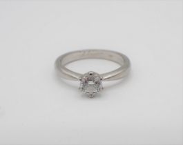 A Diamond single stone Ring claw-set brilliant-cut stone, 0.38cts, in platinum, ring size J 1/2,