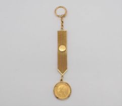 An 18ct gold Key Ring with Victorian Sovereign Fob 1872, approx 27gms all in