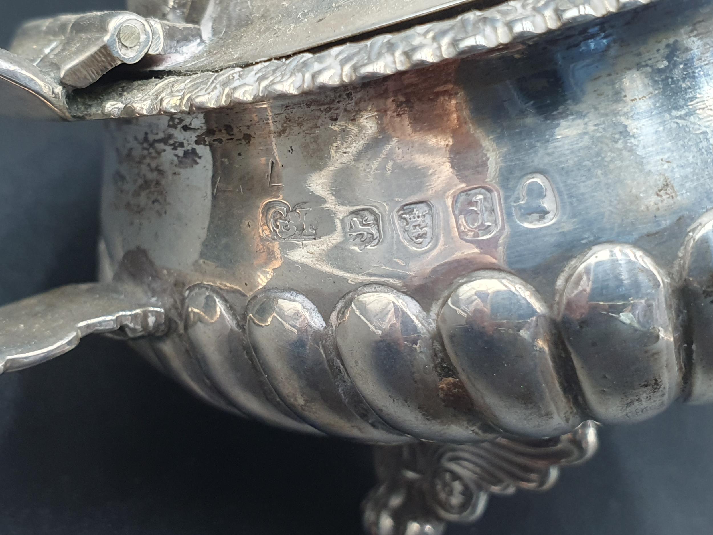 A George III silver large circular Mustard Pot, semi-fluted on anthemion and paw feet, London - Image 3 of 7