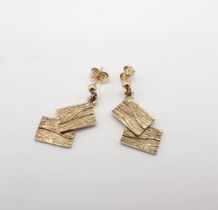 A pair of Sheila Fleet (Orkney Designer Jewellery) Earrings of textured tile effect in 9ct gold,