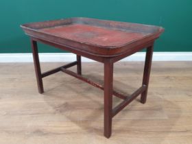 A Regency red lacquered papier maché Tray raised on later square leg stand 2ft 6in W