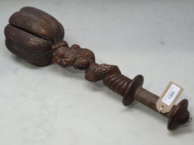 An Oriental antique carved hardwood Mace with heavy head and shaft decorated with a dragon 1ft 8in L