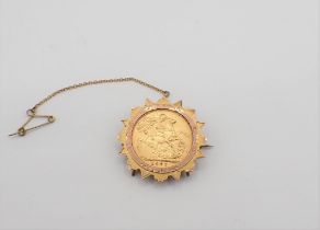 An Edward VII gold Sovereign 1907 in brooch mount marked 9ct, approx 10.70gms all in