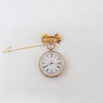 A lady's Continental Fob Watch the white enamel dial with roman numerals and floral decoration in