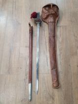 A Scottish Officer's Sword with engraved bowl shaped guard. Blade etched with George V cypher to the