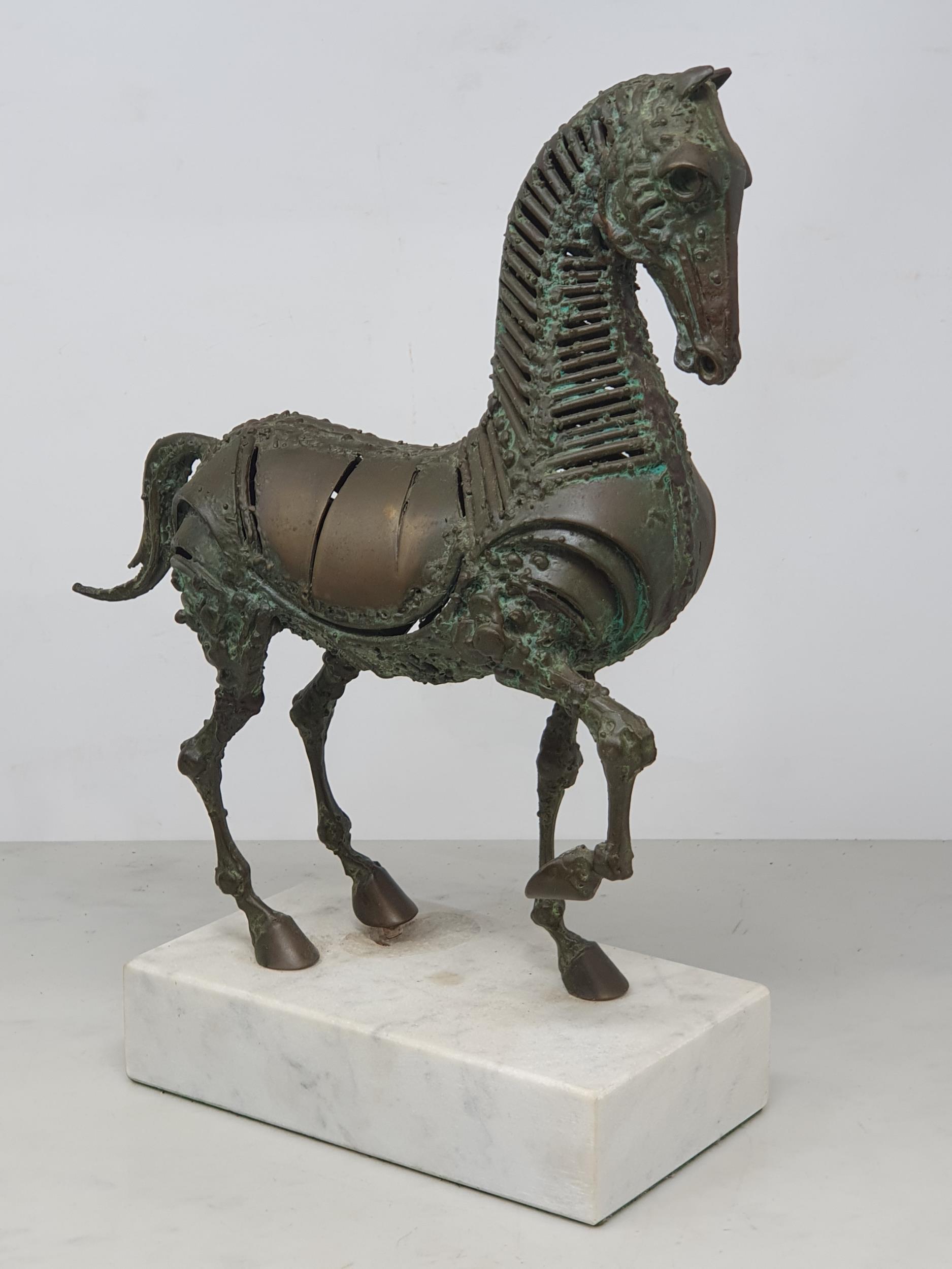 WALENTY PYTEL. A patinated bronze Sculpture of a prancing horse, mounted on a white rectangular - Image 2 of 4