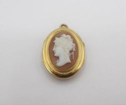 An oval carved shell Cameo Locket depicting classical bust in profile, 22mm x 30mm, approx 9gms