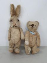 An antique mohair Rabbit with glass eyes 8in H and a small antique Teddy Bear 5 1/2in H