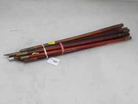 A large bore Cleaning Rod and two other Cleaning Rods