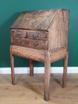 A 19th Century walnut veneered Bureau on Stand, the fall front enclosing pigeon hole interior and