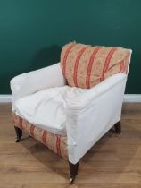 A Howard and Sons Armchair with some red and cream striped upholstery, with scroll and floral