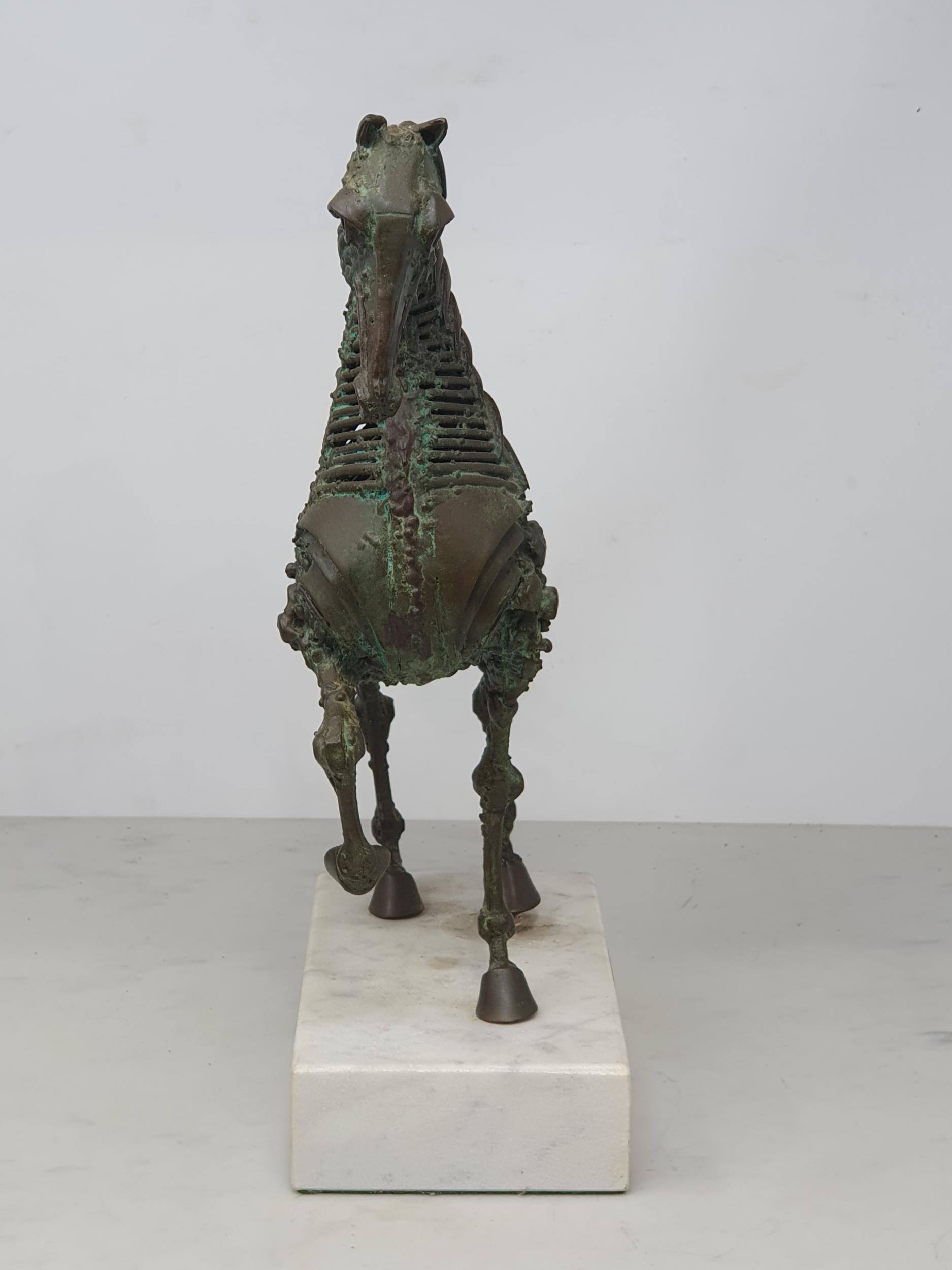 WALENTY PYTEL. A patinated bronze Sculpture of a prancing horse, mounted on a white rectangular - Image 3 of 4
