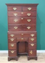 A George III mahogany Chest on chest of unusual conformation fitted two short and three long drawers