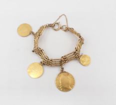 A 9ct gold gatelink Bracelet suspending one George III gold Guinea, two George III half Guineas