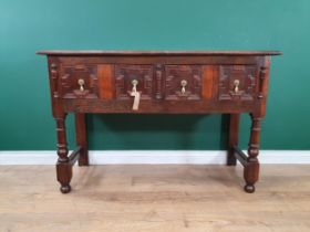 A moulded oak Dresser Base in the 17th Century style, with pair of fitted drawers, on turned