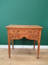 An 18th Century fruitwood Lowboy fitted three drawers around a shaped frieze and pierced fret carved