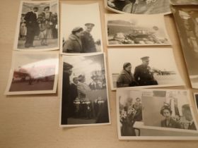 A small collection of Photographs of various members of the Royal Family and a roll of negatives,