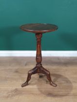 A 19th Century mahogany Manx tripod Table with dish top and turned stem, 14in D