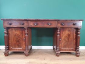 A William IV mahogany Breakfront Pedestal Sideboard, fitted three drawers above two cupboards