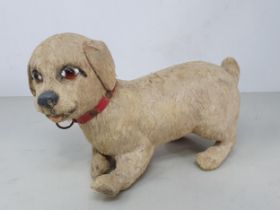 A 19th Century skin covered Dog with glass eyes 8in L