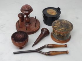 A treen 'Clark and Co's Anchor Sewing Cottons' Thread Dispenser, a treen 'The M.E.Q.' six Cord