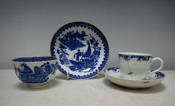 An early Worcester blue and white Tea Bowl and Saucer, fisherman pattern with fine gilt line