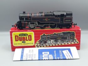 Hornby Dublo 2218 2-6-4T in mint condition showing no signs of use to the wheels or armature. Box in