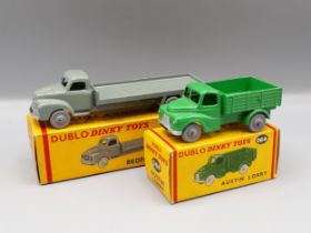 Dublo Dinky Toys 064 Austin Lorry and 066 Bedford Flat Truck, both models in mint condition, boxes