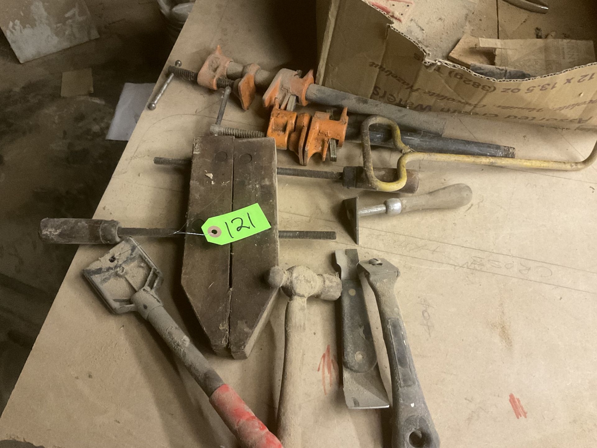Various wood clamps and scrapers