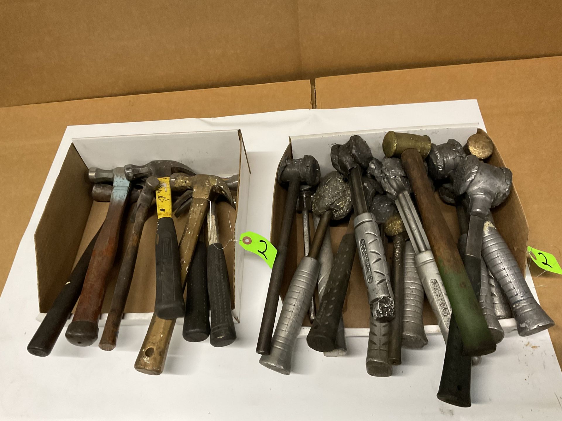 Assortment of 7 hard hammers and 16 soft hammers