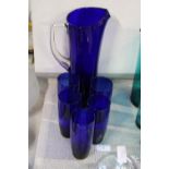 A set of five stylish blue glasses with matching jug. Jug is 30cm tall