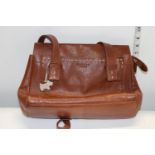 A ladies Radley of London brown leather handbag