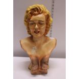 A Marilyn Monroe bust, shipping unavailable