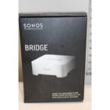 A boxed Sonos bridge