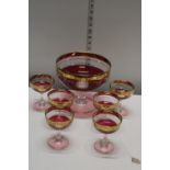 A vintage stylish glass punch bowl and set of six glasses