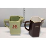 Two vintage Wade whiskey advertising water jugs