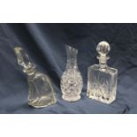 Two quality crystal decanters and a cut glass water pitcher