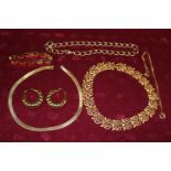 A selection of vintage gold tone costume jewellery