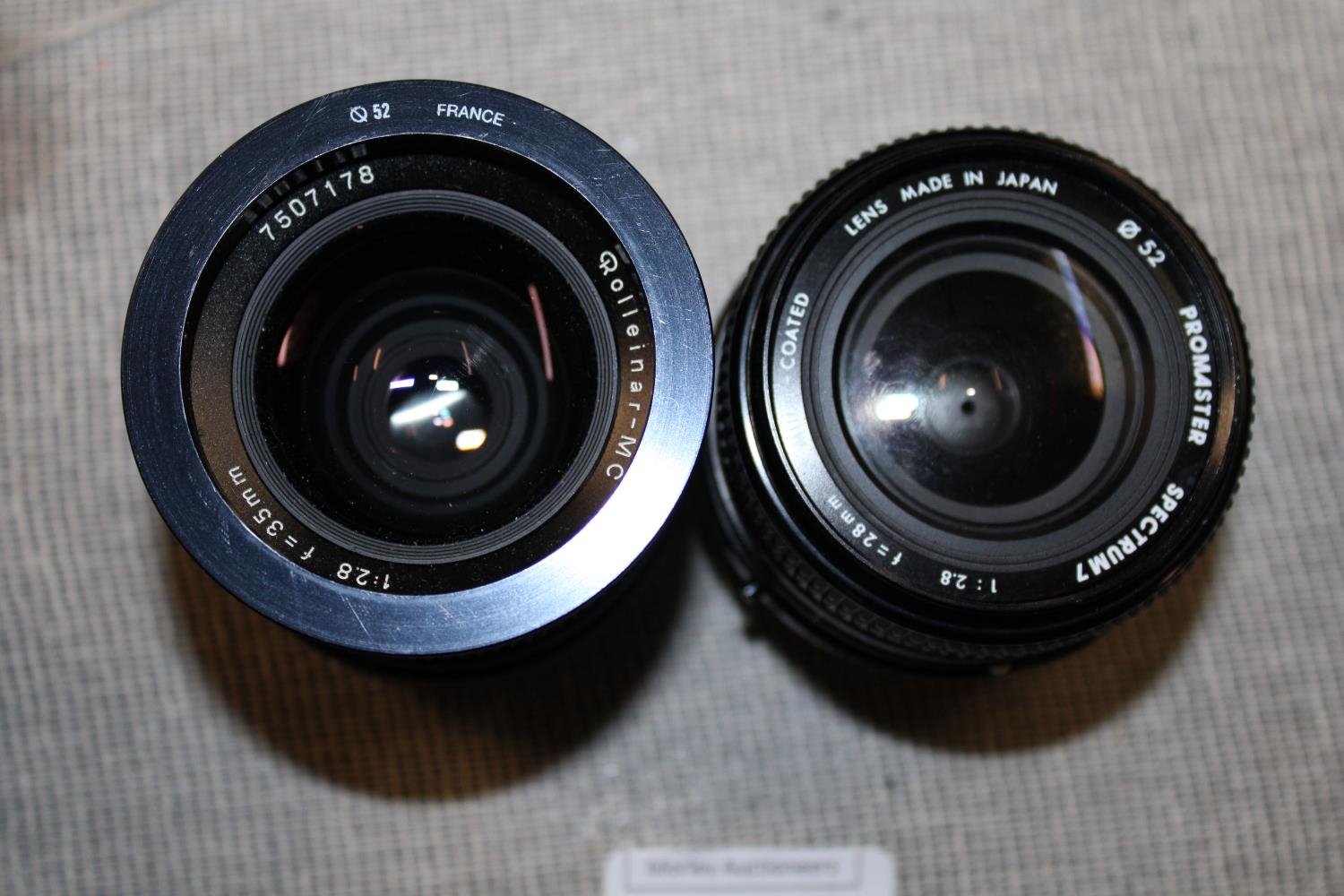 Two assorted camera lenses