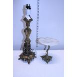 A brass lamp base & small marble topped table
