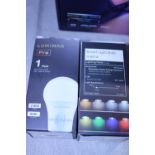 Two boxed smart light bulbs (un-checked) a/f