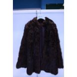 A vintage Ladies brown fur coat