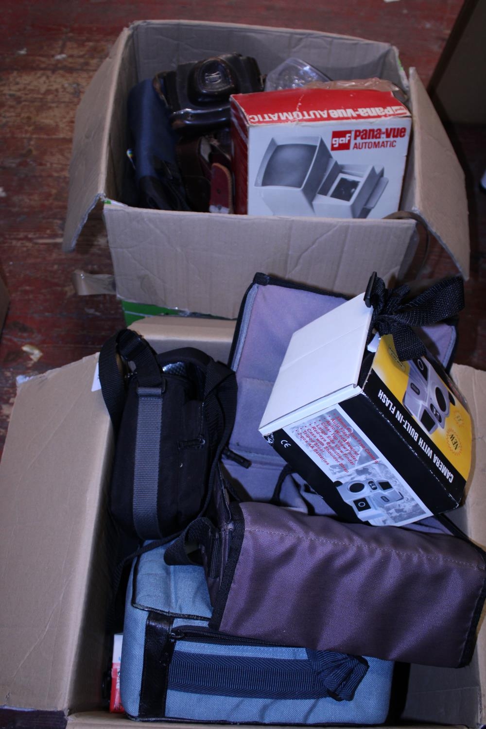 Two boxes of vintage camera cases & accessories etc. Postage unavailable