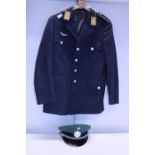 A West German air force tunic and a German police cap