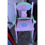 A child's wooden rocking chair Postage unavailable