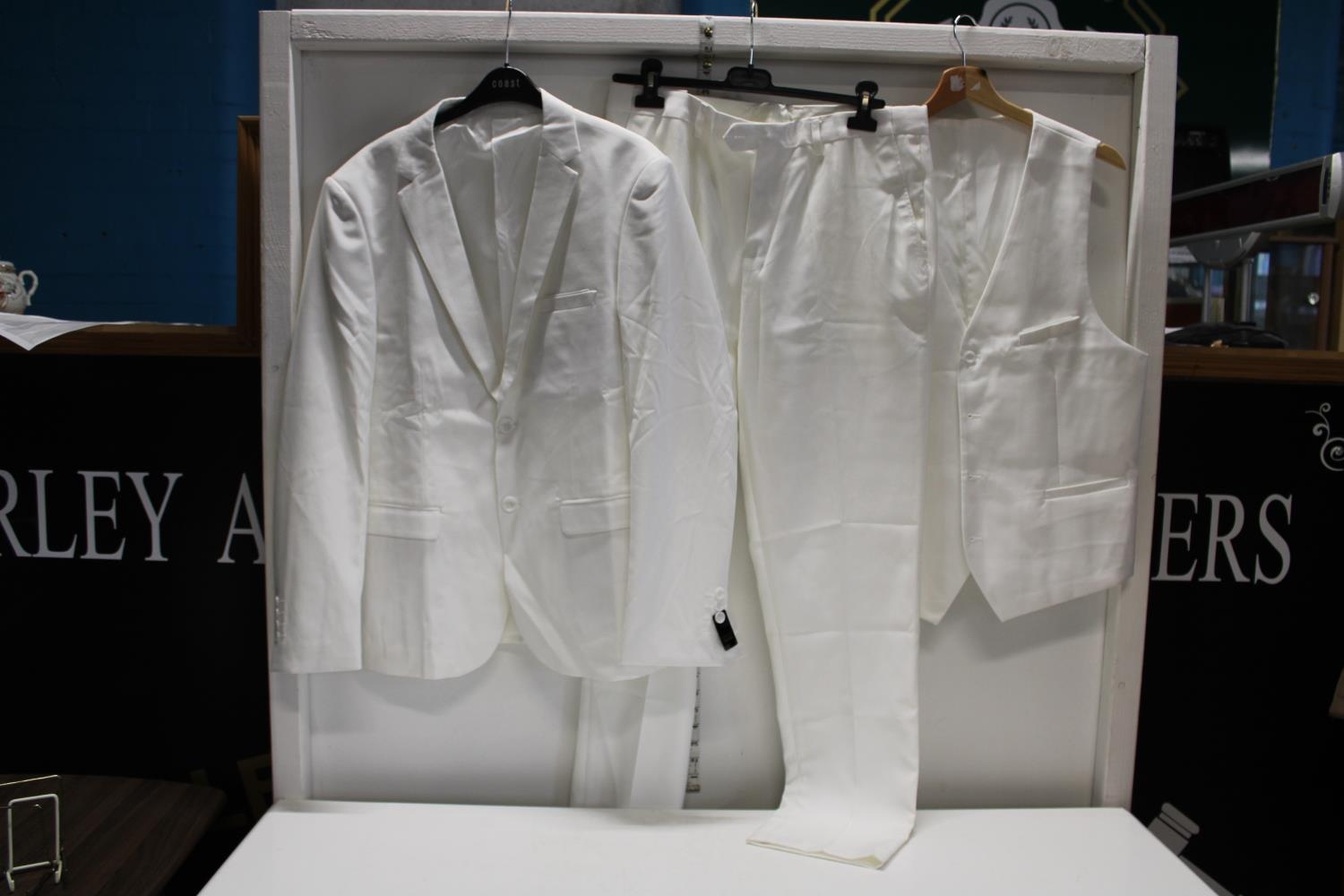 A men's white suit