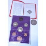 A selection of collectable coins and a 1999 £5 coin