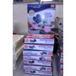 Eight boxes of new Micro Slippers (microwavable)