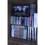 A job lot of DVD boxsets and CD's