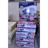 Eight boxes of new heated Micro Slippers (microwavable)